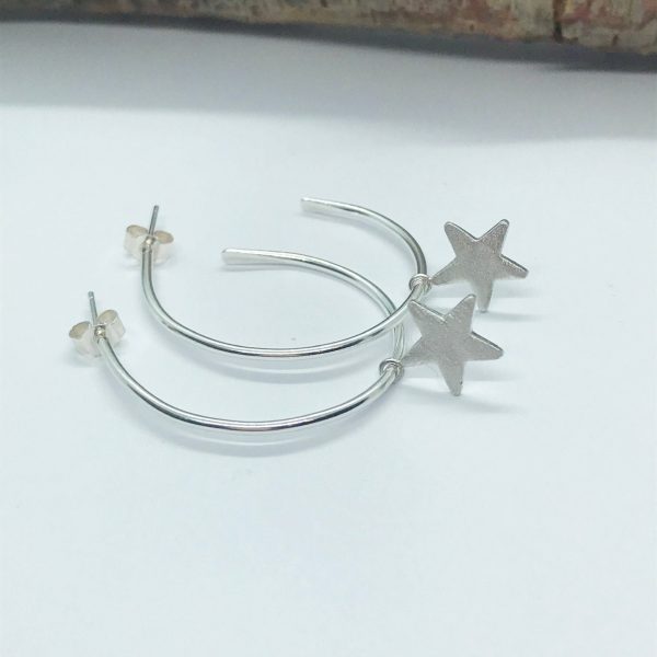 LorriSilverJewellery Hoop earrings with textured star on white background