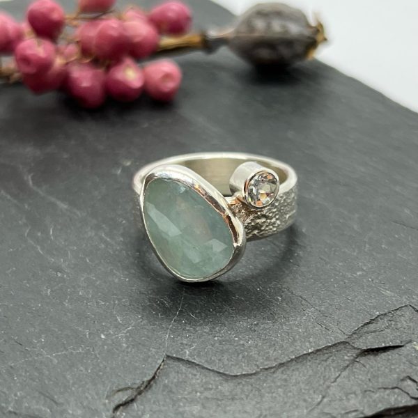 LorriSilverJewellery, double aquamarine ring on grey tile