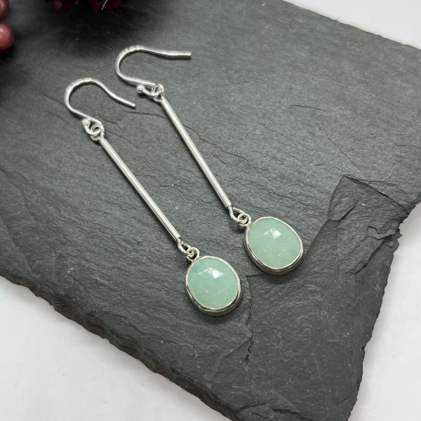 Amazonite drop earrings on grey tile