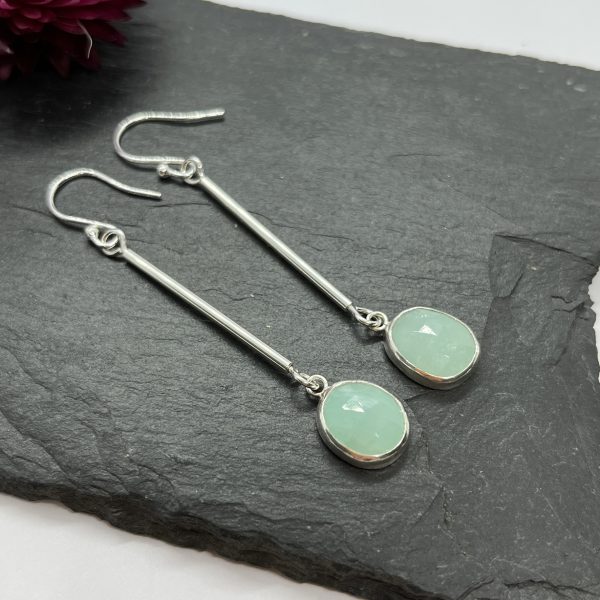 Amazonite drop earrings on grey tile