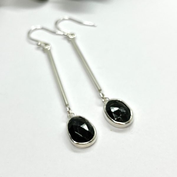 Black Tourmaline drop earrings on white background