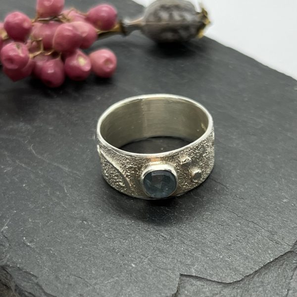 LorriSilverJewellery, moss aquamarine wide band ring on grey tile