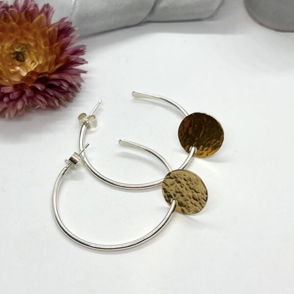 Lorrisilver jewellery, gold circle sterling silver hoops.