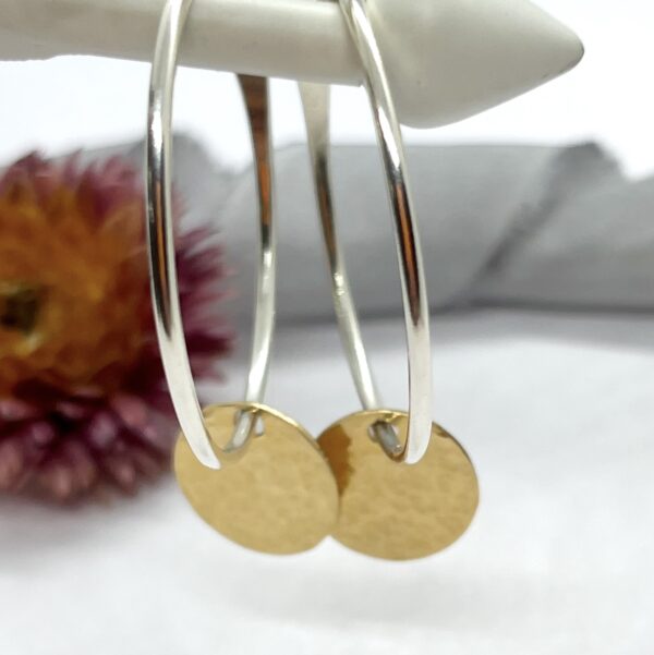 Lorrisilver jewellery, gold circle sterling silver hoops.