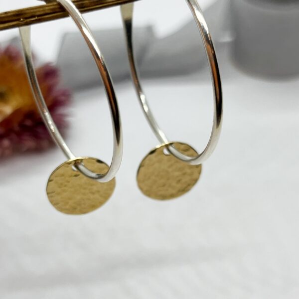 Lorrisilver jewellery, gold circle sterling silver hoops.