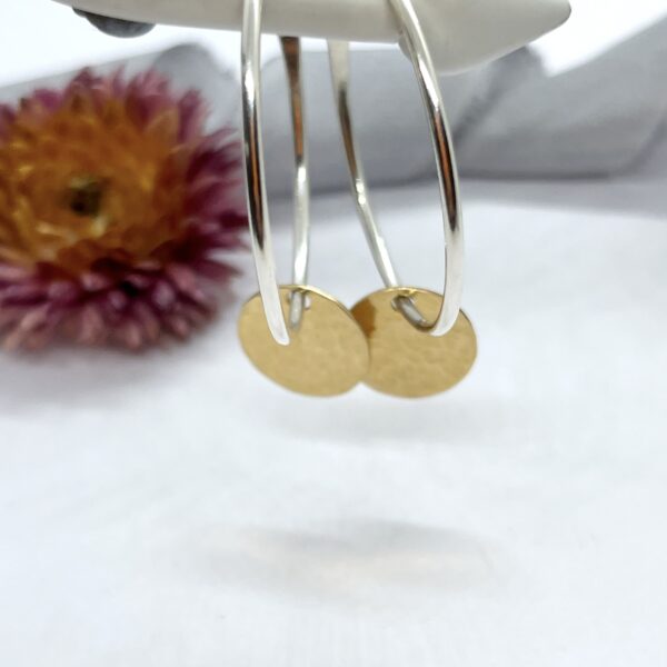 Lorrisilver jewellery, gold circle sterling silver hoops.