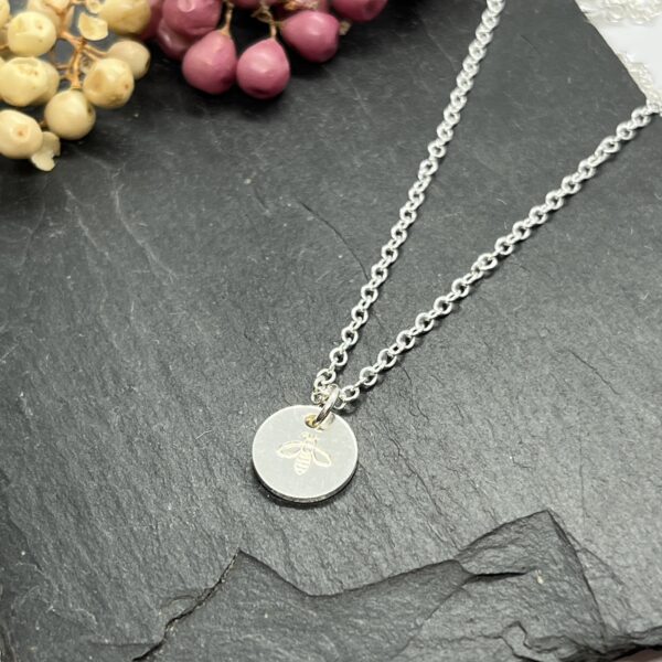 Manchester bee necklace on a grey background, lorrisilver Jewellery